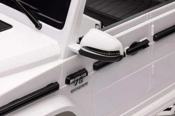 Kinderfahrzeug - Elektro Auto "Mercedes G63 AMG" - Lizenziert - 12V Akku,2 Motoren- 2,4Ghz Fernsteuerung, MP3+Ledersitz+EVA-Weiss – Bild 8
