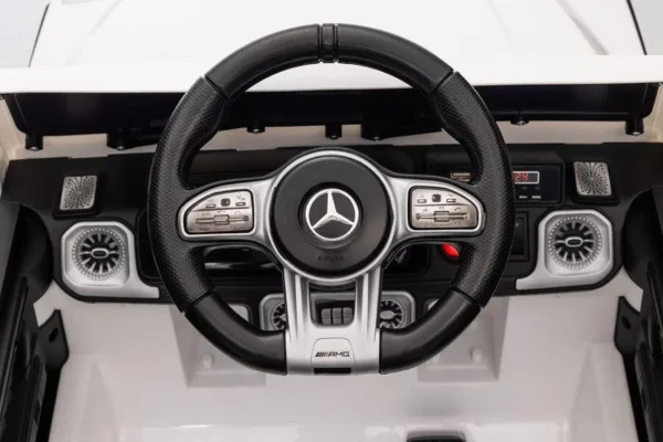 Kinderfahrzeug - Elektro Auto "Mercedes G63 AMG" - Lizenziert - 12V Akku,2 Motoren- 2,4Ghz Fernsteuerung, MP3+Ledersitz+EVA-Weiss – Bild 9