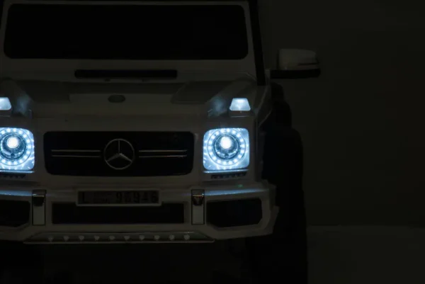 Kinderfahrzeug - Elektro Auto "Mercedes G63 AMG 6x6" - lizenziert - 12V7AH Akku + 2,4Ghz+Ledersitz+EVA-Weiss – Bild 7