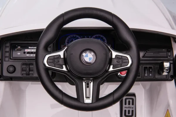 Elektro Kinderfahrzeug "BMW M5" - lizenziert - 12V7A Akku, 2 Motoren- 2,4Ghz Fernsteuerung, MP3, Ledersitz+EVA-Weiss – Bild 2