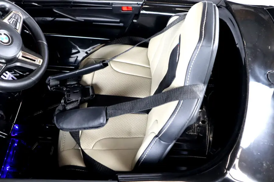 Elektro Kinderfahrzeug "BMW M5" - lizenziert - 12V7A Akku, 2 Motoren- 2,4Ghz Fernsteuerung, MP3, Ledersitz+EVA-Schwarz – Bild 8